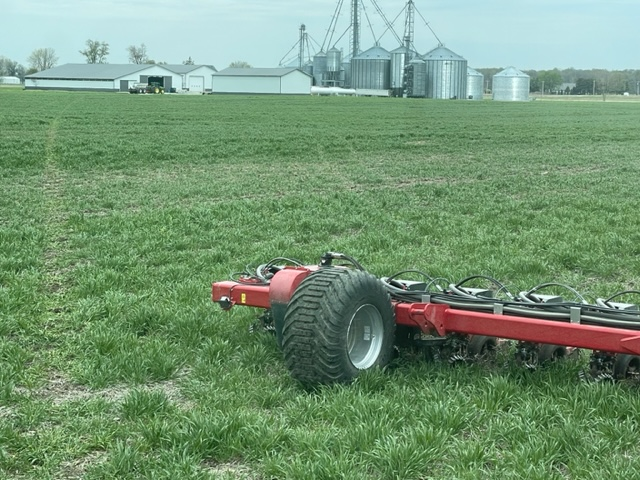 A picture containing grass, outdoor, wheel, sky

Description automatically generated